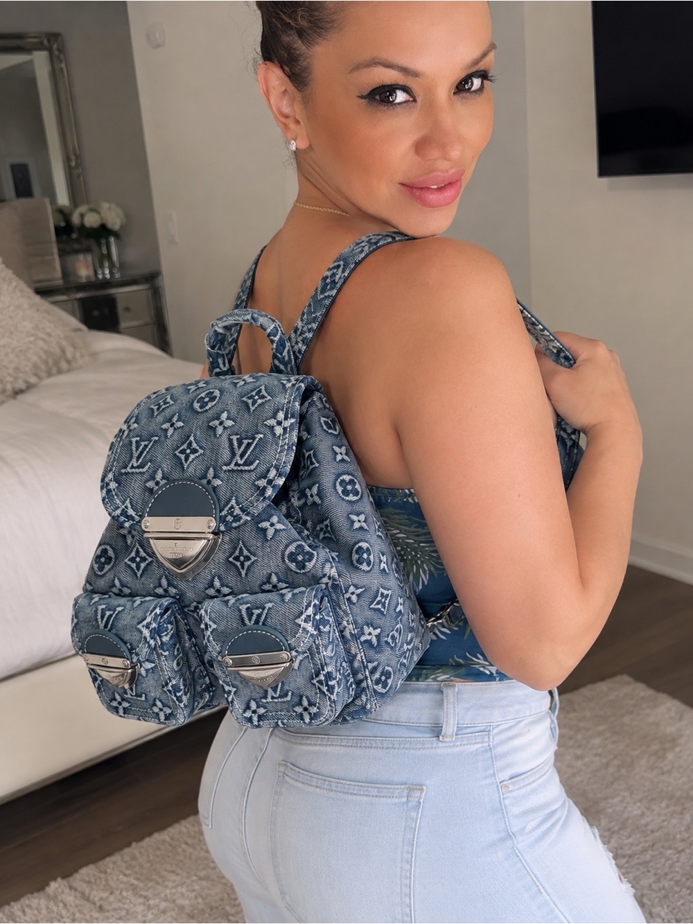 you are buying under no brand Denim Monogram Mini Backpack in Washed Blue